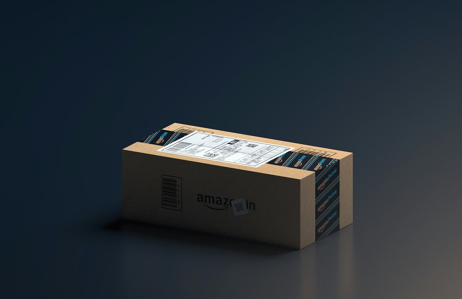An Amazon box sitting on top of a table.