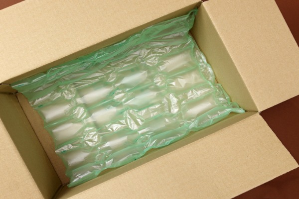 Bubble quilt air pillow packed inside a cardboard box
