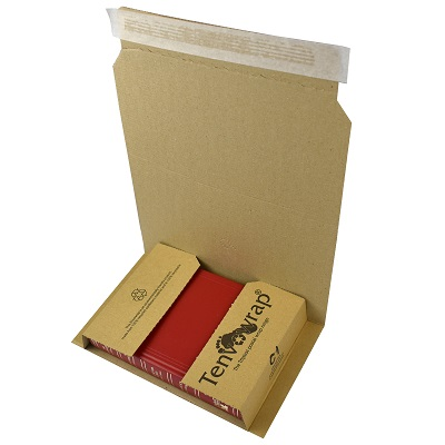 Open Tenvowrap book wrap mailer made from recycled corrugated board, showing a peel-and-seal closure with a red flat item secured inside.
