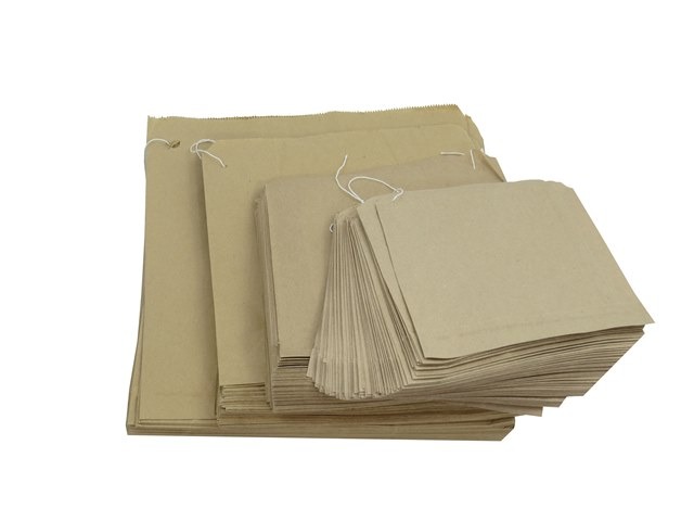 Four sets of Flat Kraft Strung Bags in varying sizes 