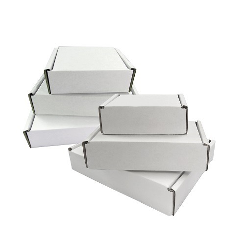 White recycled die-cut postal boxes shaped for Royal Mail Large Letter eco-friendly shipping